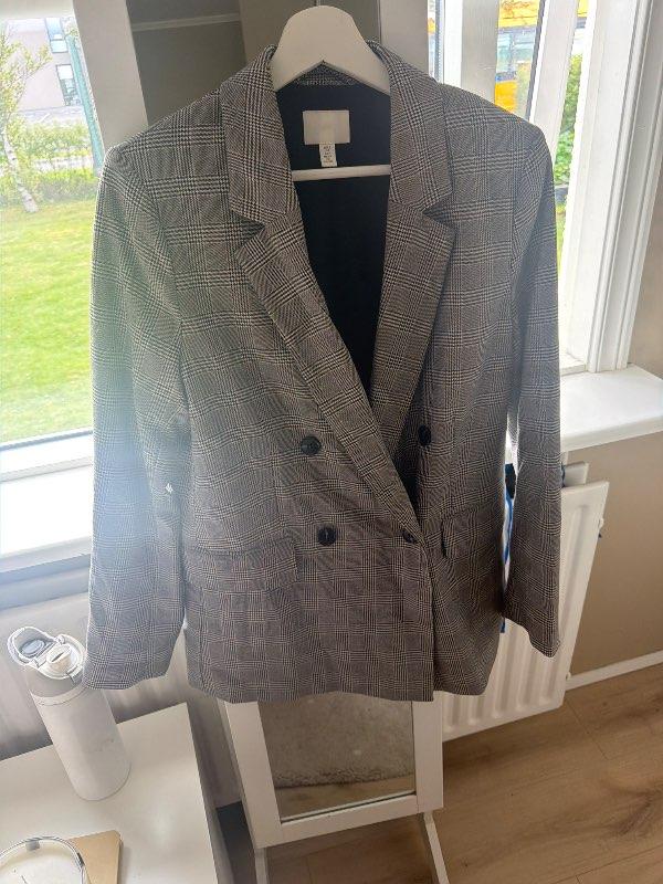 Köflóttur blazer