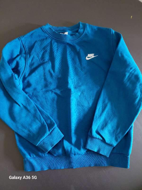 Nike túrkispeysa